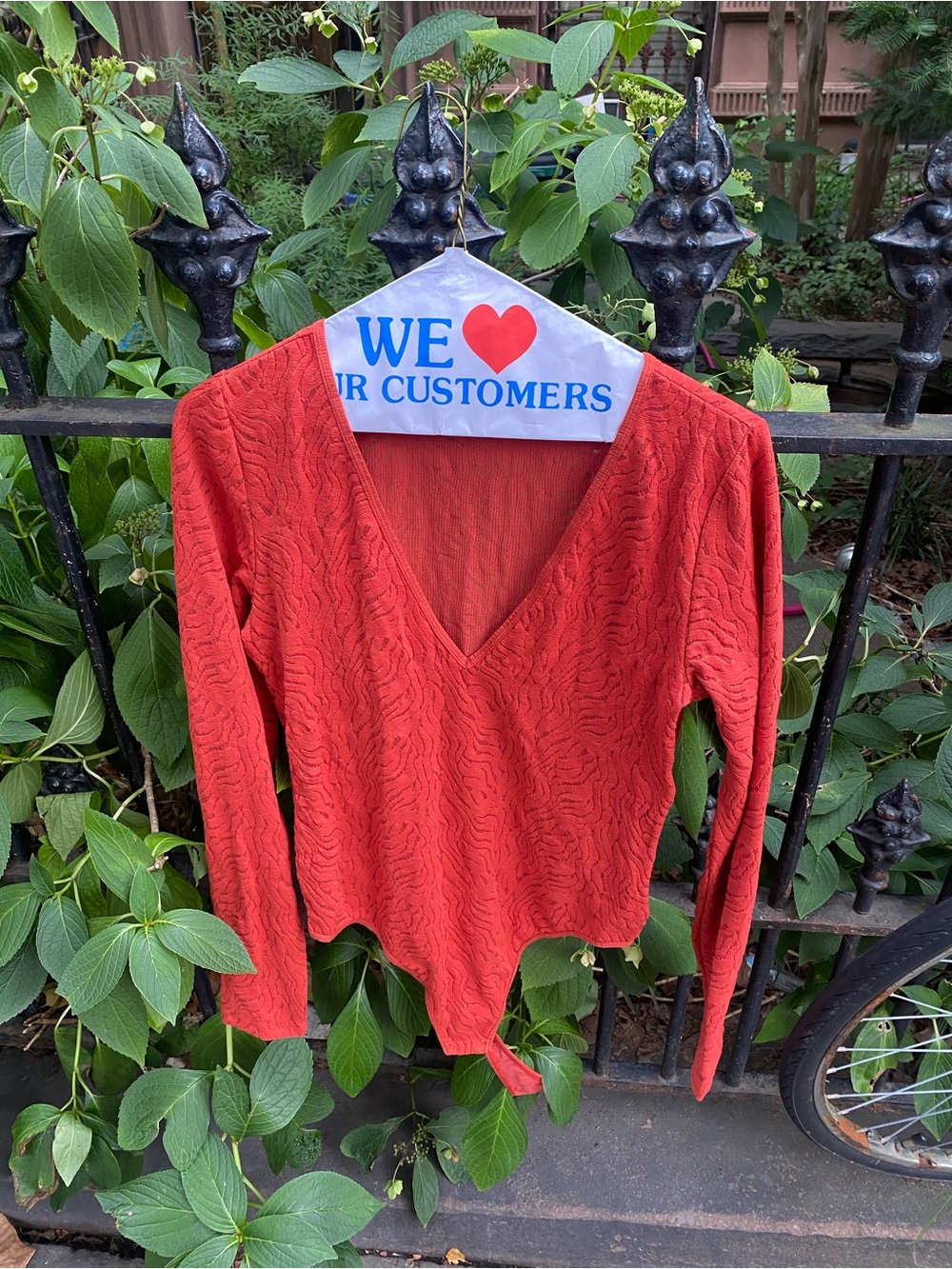 Babaton Textured Zebra Burnout Deep V-Neck Leotard Shirt in Red-Orange